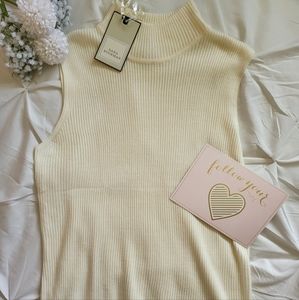 NWT cream sleeveless mock sweater top -Size Large